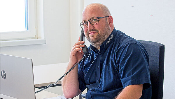 eisenberger GmbH Kundendienst Mitarbeiter am Telefon